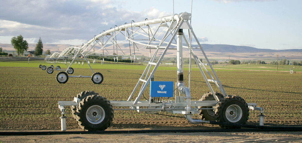 White Valley center pivot with wheels out in a field